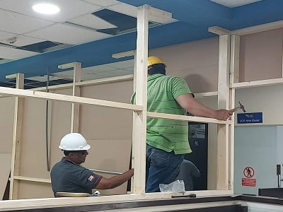 Carpenter work in progress in an office carpentry services by Hudson Engineering