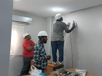 Hudson Engineering Team performing renovation service in an office office & Home renovation service in Karachi Pakistan