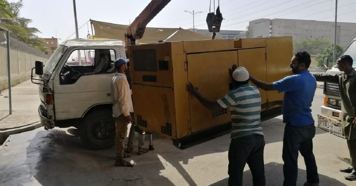 Hudson Engineering Team are installing a generator through a crane